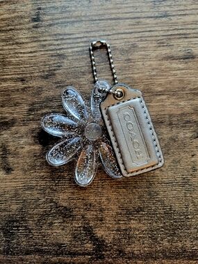 COACH Clear Glitter Daisy Keychain with Leather Tag